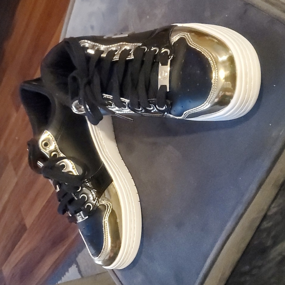 Black and gold GBG BY Guess platform sneakers